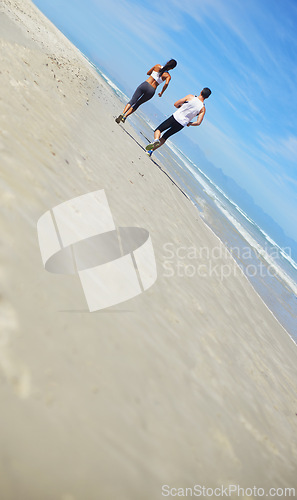 Image of Sand, space or couple on beach running in exercise, training mockup or outdoor workout at sea. Sports people, runners or healthy athletes in nature for cardio endurance, wellness or fitness challenge