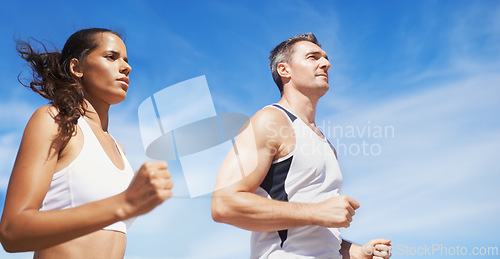 Image of Running, beach and couple with fitness, summer and weekend break with cardio and training for wellness. Runners, seaside and man with woman and support with practice and activity for health and hobby