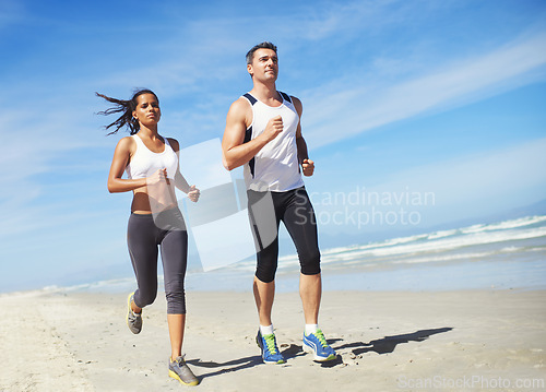 Image of Fitness, teamwork or couple on beach running for exercise, training or outdoor workout at sea. Sports people, runners or healthy athletes in nature for cardio endurance, wellness or challenge on sand