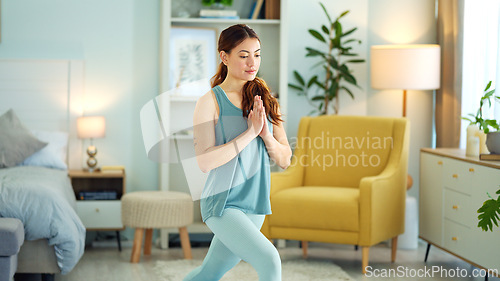 Image of Woman, yoga and stretching in home living room for wellness, fitness and relax for mind, body and zen. Girl, exercise and workout for mindfulness, self care and health for peace of mind in Dublin