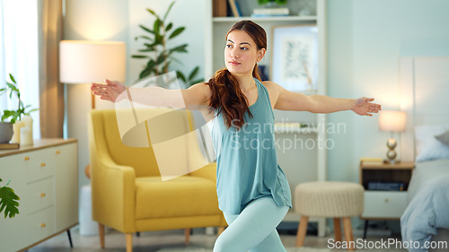 Image of Woman, yoga and stretching in home living room for wellness, fitness and relax for mind, body and zen. Girl, exercise and workout for mindfulness, self care and health for peace of mind in Dublin