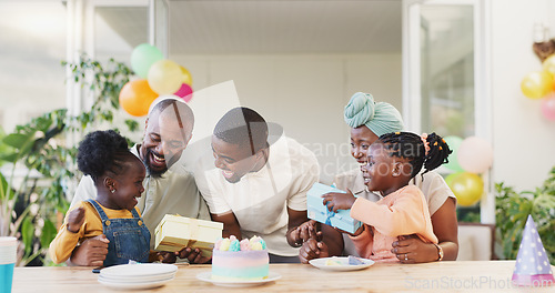Image of Birthday, present and black family celebrate with children with love, care and surprise. African woman, men and happy kids together at home for a gift, quality time and fun at a party with cake