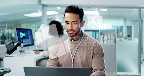 Image of Man, laptop and lab for futuristic medicine or science or online internet for research, microscope or study. Male person, innovation and biotechnology project for investigation, cure or development