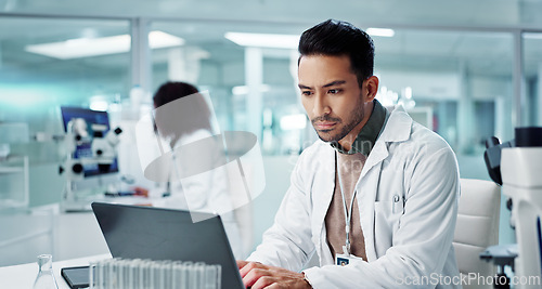 Image of Tablet, scientist and typing on laptop in laboratory, healthcare and online research for medicine with analysis. Asian expert, computer and reading on clinical trials and information for innovation