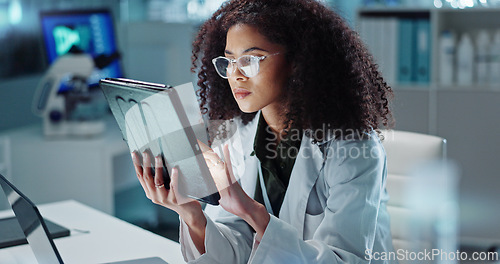 Image of Tablet, reading and woman scientist in laboratory working on medical research, project or experiment. Science, career and female researcher with digital technology for pharmaceutical innovation.