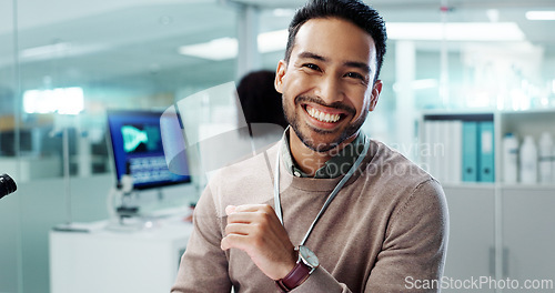 Image of Asian man, smile and working in laboratory for innovation, pharmaceutical or research study. Male employee, happy and confident in testing facility for reviewing, development or data analysis