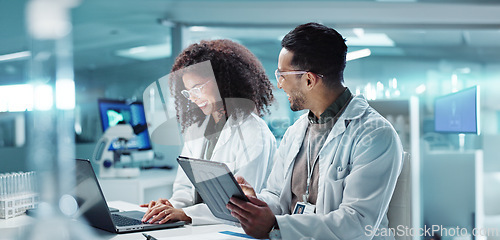 Image of Science, teamwork and laptop with laughing in laboratory for communication, pharmaceutical review or planning. Employees, collaboration and technology for research, discussion and digital analysis
