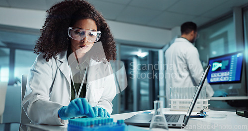 Image of Woman, scientist or blood vial for exam in laboratory, healthcare or pathology to label on test tube. Biotechnology, pharmaceutical and laptop by doctor and online scientific results in phlebotomy