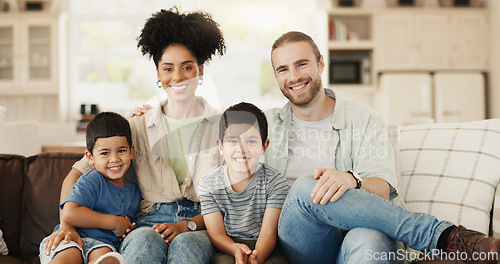 Image of Smile, love and face of a family on sofa for relaxing and bonding together in the living room. Happy, proud and portrait of boy children or kids sitting with their young parents at their modern home.