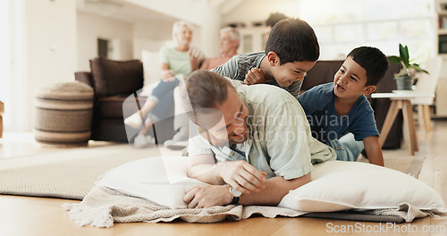 Image of Funny, playing and father with children on floor in home living room laughing at comedy, joke or humor. Happy, dad and kids having fun, bonding and enjoying family time together in adoption house.