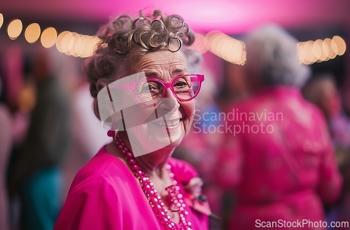 Image of Smiling Elderly Lady in Pink Glasses Enjoying Party Celebration