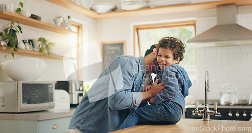 Image of High five, dad and kid playing in the kitchen or happy moment, memory or quality time together in family home or house. Bonding, game and father being silly, funny or crazy with son, boy or children