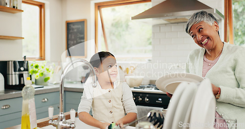 Image of Happy, grandmother and child washing dishes with help, teaching and learning from a senior. Smile, support and an elderly woman and a girl kid cleaning the kitchen together in a house for routine