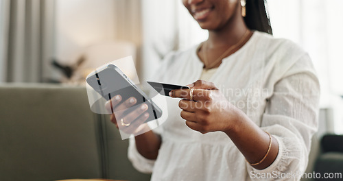 Image of Hands, woman and credit card with smartphone on sofa for online shopping, payment and fintech at home. Closeup, mobile banking and finance for sales, password and code for ecommerce, money or savings