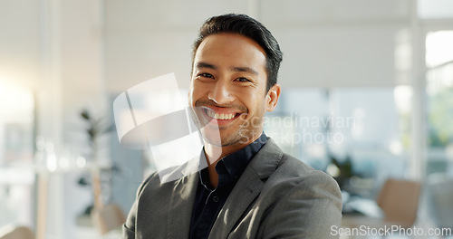 Image of Crossed arms, laugh and face of business Asian man in office for leadership, empowerment and success. Corporate, manager and portrait of happy person in workplace for ambition, pride and confidence
