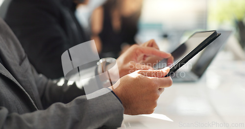 Image of Hands of man at meeting in office with tablet, email or social media for business feedback, schedule or agenda. Networking, digital app and businessman online for market research, report and workshop