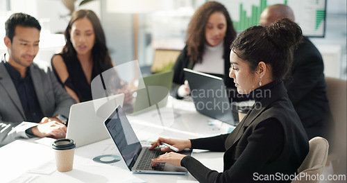 Image of Woman at meeting in office with laptop, internet and review for business feedback, schedule or agenda. Networking, typing and businesswoman online for market research, report document and workshop.