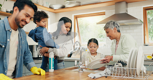 Image of Cleaning, family and man in a kitchen with cloth for table, hygiene or clean living space after dinner. Washing, dishes and guy parent with household chore for safety from bacteria, dirt or germs