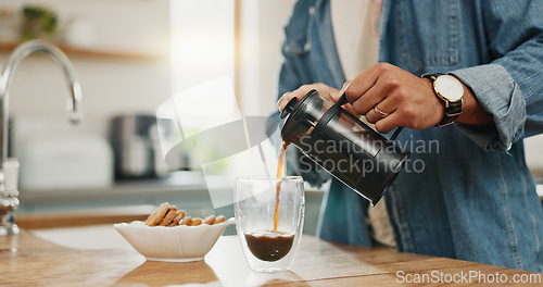Image of Hands, pouring coffee and breakfast in home kitchen, energy and start morning with warm matcha at table. Man, filter kettle and french press plunger for fresh organic caffeine at house for hot drink
