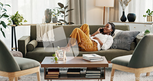 Image of Phone call, laugh and black woman on sofa for talking, funny conversation and online discussion. Networking, communication and person relax on smartphone with humor, joke and comedy chat in home