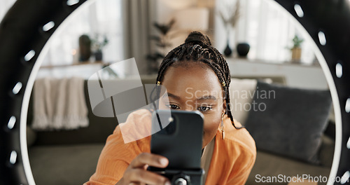 Image of Video, content creator and black woman doing skincare for tutorial on social media or the internet. Dermatology, happy and African female influencer filming or live streaming face routine at home.