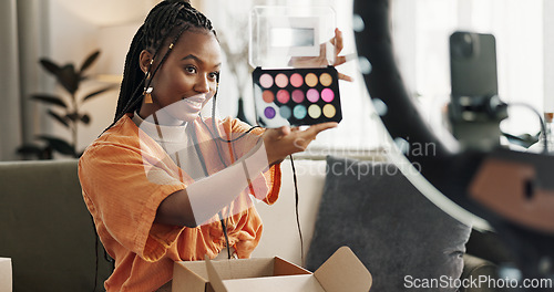 Image of Video, content creator and black woman doing makeup for tutorial on social media or internet. Cosmetic, happy and young African female influencer film or live stream face cosmetology routine at home.