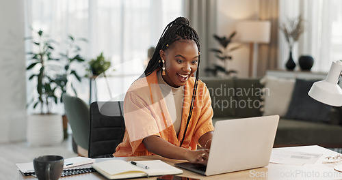 Image of Black woman, typing in home office and laptop for research in remote work, social media or blog in apartment. Freelance girl at desk with computer writing email, website post and online chat in house