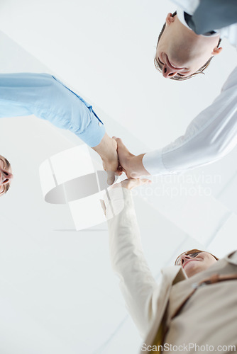 Image of Hands, high five and low angle of people with success, celebration and support for achievement in teamwork. Business, collaboration and group with cooperation, solidarity and team building gesture