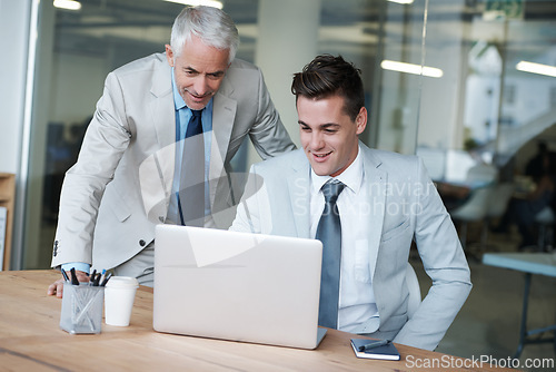 Image of Boss, businessman and partner with laptop, plan and work for key accountants and budget costs. CEO, employer at desk in office, company and meeting for tax administration and enterprise growth