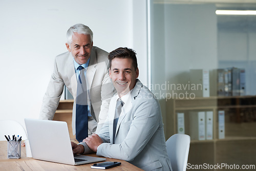 Image of Boss, businessman and coworker with laptop, plan and work for expanding in office and accounts. Executive, employer and accountant at desk, company and meeting for management and staff administration