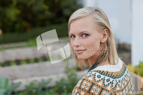 Image of Gardening, happy and portrait of woman with plants for landscaping, planting flowers and growth. Agriculture, nature and face of person outdoors for environment, ecology and nursery in garden