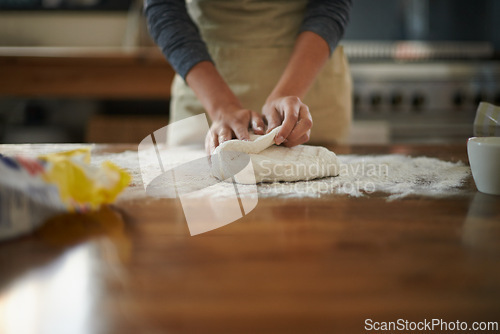 Image of Hands, dough and flour on kitchen counter at bakery, bread or pizza with meal prep, catering and cooking. Culinary, chef or baker person with pastry preparation, ingredients and food for nutrition