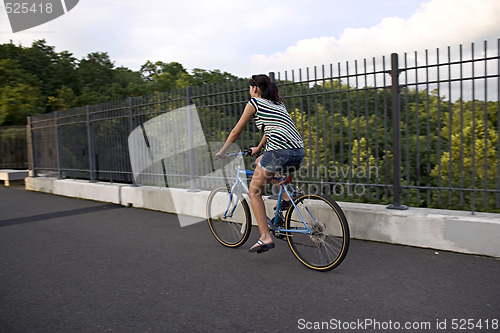 Image of Woman on a Bike