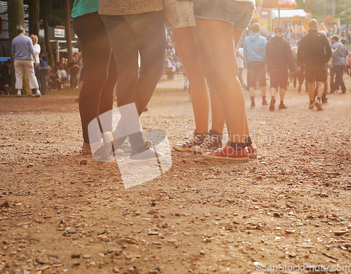 Image of Legs, forest and group of people at festival together for social event, party or summer celebration. Flare, crowd and friends in woods for talking, bonding or free time in nature with audience