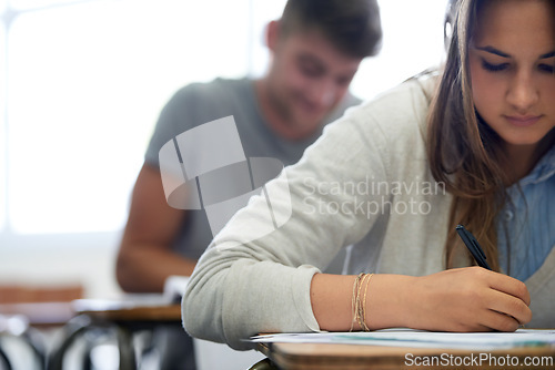 Image of College, writing and woman in classroom with notebook for development in learning, opportunity and future. Education, knowledge and growth for university student in lecture, studying for exam or test