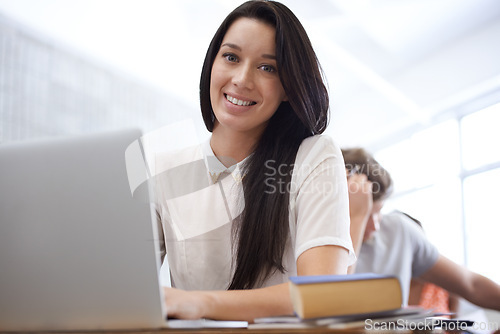 Image of University, books and portrait of woman in classroom with development in learning, opportunity and future. Education, knowledge and growth for college student in lecture, studying for exam or test.