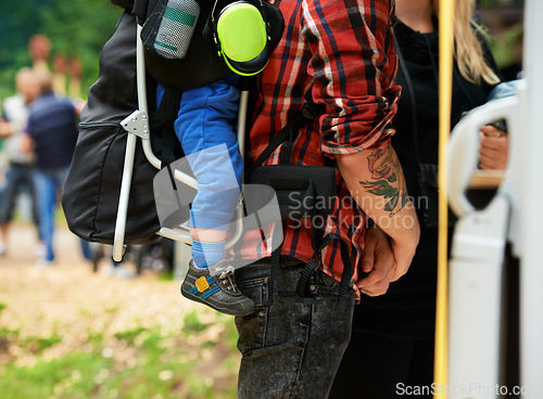 Image of Man, child and woman in nature at music festival in woods, relax and family at carnival in outdoor. Father, kid and mother for bonding together on vacation and love in forest for social in community