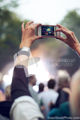 Image of Hands, cellphone and picture at music concert in crowd for social media post for holiday, carnival or celebration. Person, photography and summer event for travel party or forest, camping or festival