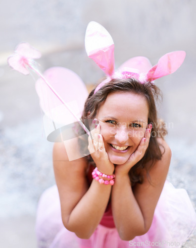 Image of Portrait, outdoor and woman with bunny ears, fairy and party with Halloween outfit and social gathering. Face, person and girl with sunshine and weekend break with happiness and costumes with a smile