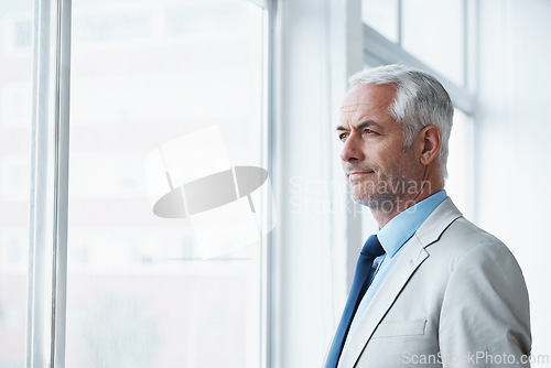 Image of Mature, man and thinking of business at window, planning for future and idea for office. Professional, mindset and businessman remember a dream for company and consider decision, choice or solution