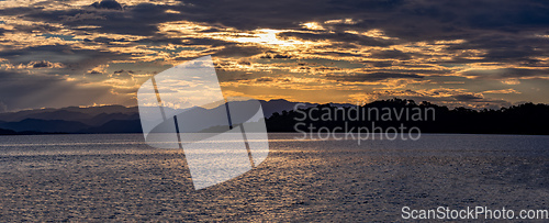 Image of Romantic sunset over sea landscape. Tarcoles, Costa Rica