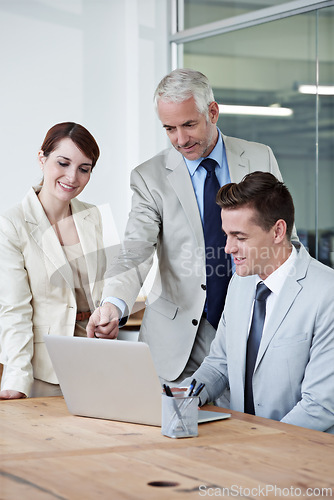 Image of Laptop, discussion and business people in office for research on corporate legal project in collaboration. Team, meeting and group of attorneys work on law case with computer in workplace boardroom.