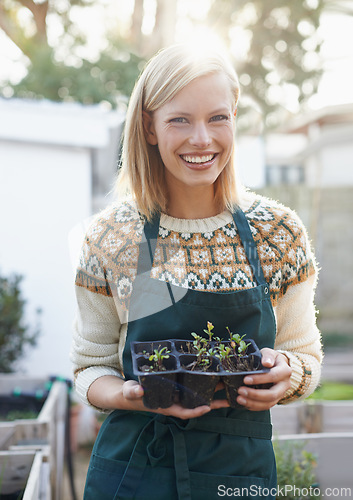 Image of Gardening, backyard and portrait of happy woman with plants for landscaping, planting flowers and growth. Agriculture, nature and person outdoors for environment, ecology and nursery in herb garden