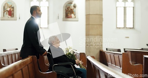 Image of Sad, funeral and church with old woman and wheelchair user for death, mourning and widow. Depression, grief and help with person with a disability at chapel for bereavement, burial ceremony and loss