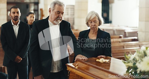 Image of Funeral, grief and death with old woman in church for farewell, thinking and sad. Mental health, depression and respect with senior person at memorial service for mourning, remember and faith