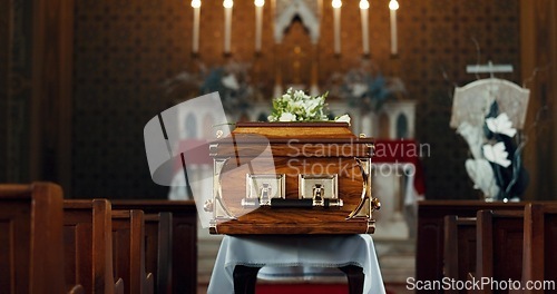 Image of Coffin, church and funeral service in closeup, memorial and event to celebrate life, worship and faith. Casket, burial and memory with death, mourning and compassion for farewell, sermon and religion