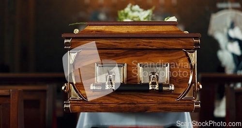 Image of Casket, church and funeral with service in closeup, zoom or event to celebrate life, worship or faith. Wood coffin, burial and memory in death, mourning or compassion for farewell, temple or religion