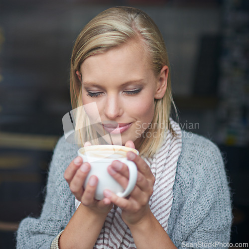 Image of Coffee shop, happy and woman with aroma for drink, caffeine beverage and cappuccino for scent. Smile, relax and person with mug in restaurant, cafe and diner for breakfast, satisfaction and wellness