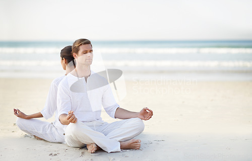 Image of Couple, yoga and sea with meditation, sand or waves with sitting in morning for mindfulness with space. Man, woman and peace for namaste with spiritual growth, balance and zen at beach in Cape Town