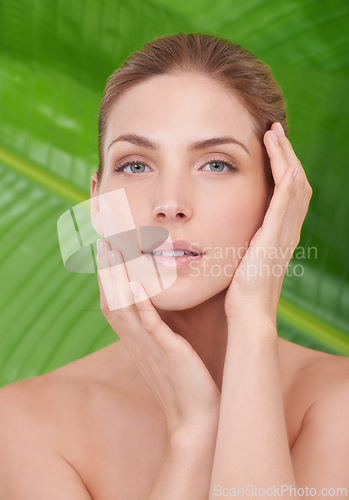 Image of Woman, skincare and portrait with beauty, plants and sustainability for organic cosmetics. Girl, person or model with palm tree for wellness, touch or glow with dermatology for facial skin by leaves